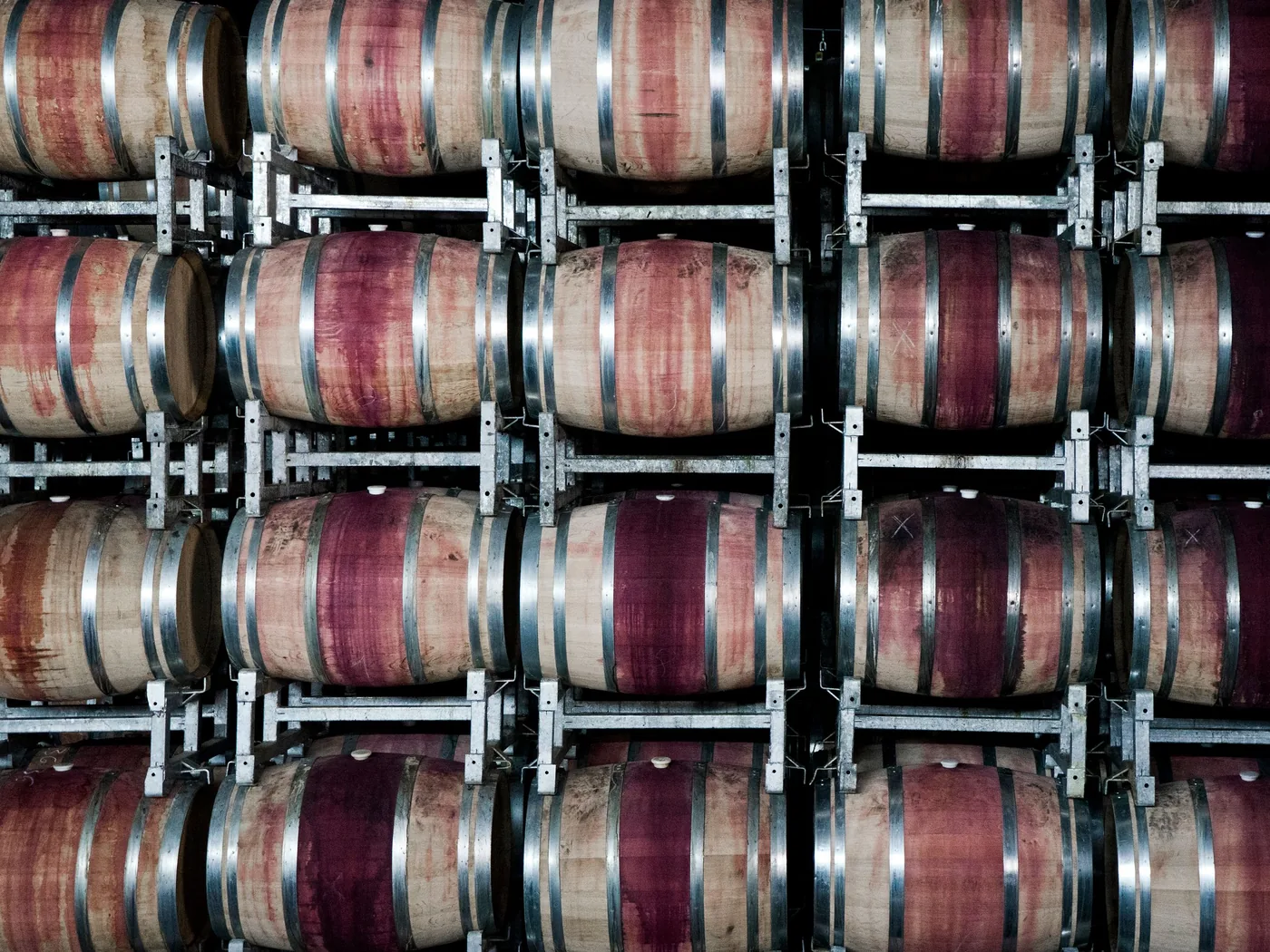 Oak barrels in a family-run Chianti winery cellar